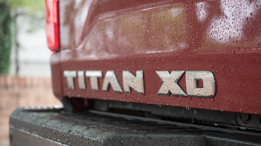 Логотип Nissan Titan XD PRO-4X 2017 года  (NA) (фото 7 из 23)